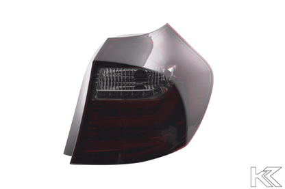 BMW 1 Series E87/E81 3/5-door red smoked LED tail lights by K2 Industries, for models 2004-2007, showcasing sleek design and lighting.