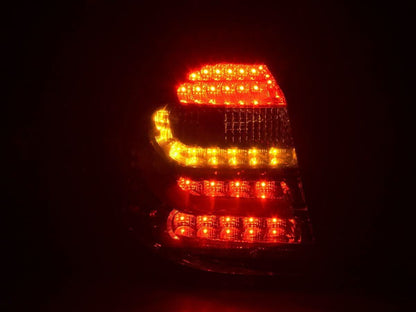BMW 1 Series E87/E81 3/5-Door red smoked LED tail lights by K2 Industries, 2004-2007, showing sleek tail light design.