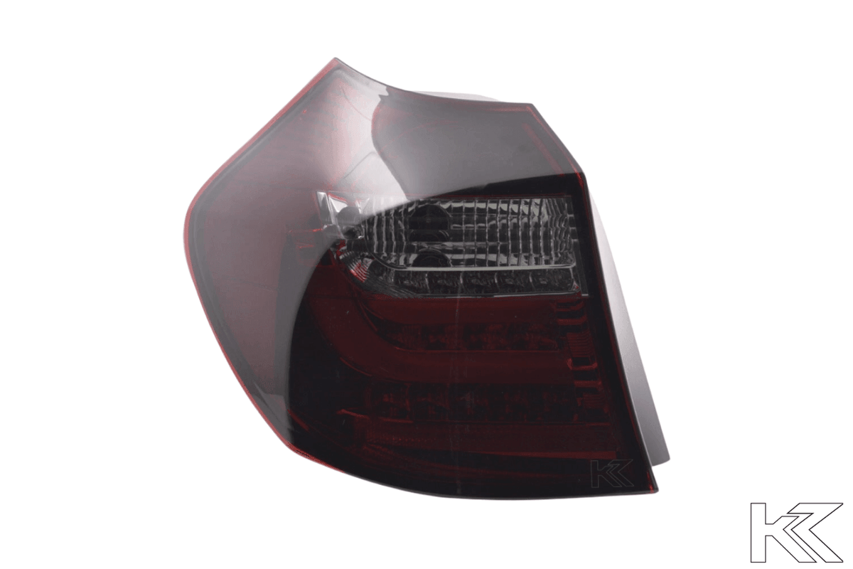 BMW 1 Series E87/E81 3/5-door red smoked LED taillights by K2 Industries, showing the stylish tail light design for 2007-2011 models.