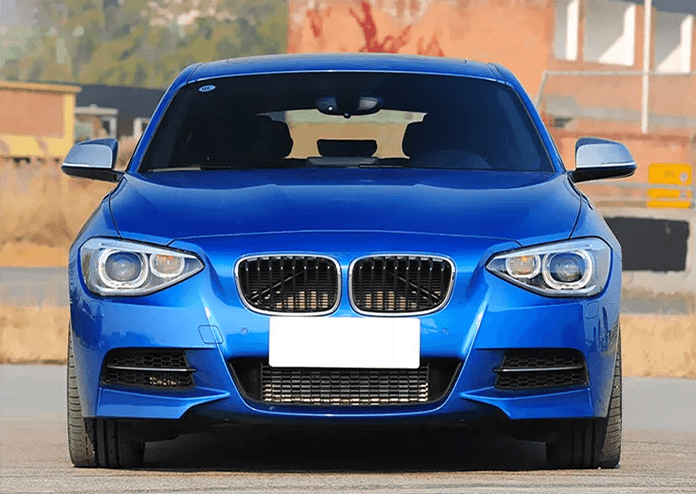 BMW 1-Series F20 OE style headlights upgrade by K2 Industries for 2012-2016 model, showing sleek headlight design with clear lenses.