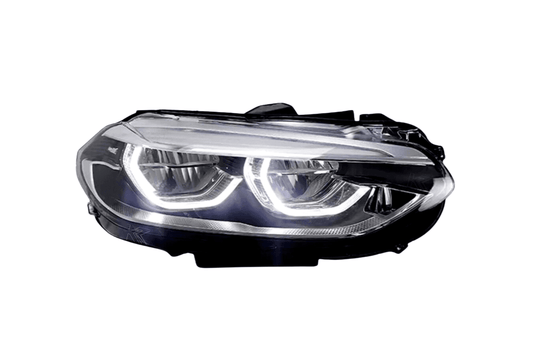 BMW 1-Series F52 headlight upgrade with OE+ design by K2 Industries, for models 2016-2020, showing the illuminated headlight.