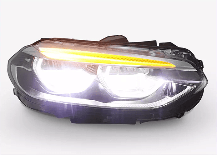 BMW 1-Series F52 headlight upgrade by K2 Industries, OE+ style, for models 2016-2020, showing the upgraded headlights on the vehicle.
