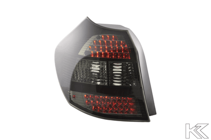 BMW 1 Series E87 black LED taillights by K2 Industries, rear view showing sleek tail light design for 2004-2007 models.