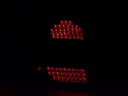BMW 1 Series E87 black LED tail lights by K2 Industries for 2004-2007, showing close-up of sleek taillight design.