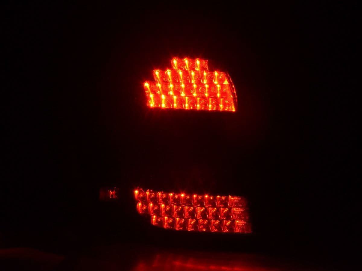 BMW 1 Series E87 black LED tail lights by K2 Industries, for 2004-2007 model, showcasing sleek rear lighting design