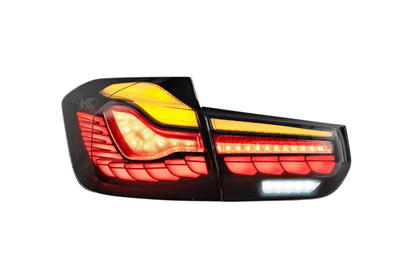 BMW 3-Series F30 F35 F80 GTS style OLED dynamic tail lights in red or smoked by K2 Industries, for 2012-2019 models.