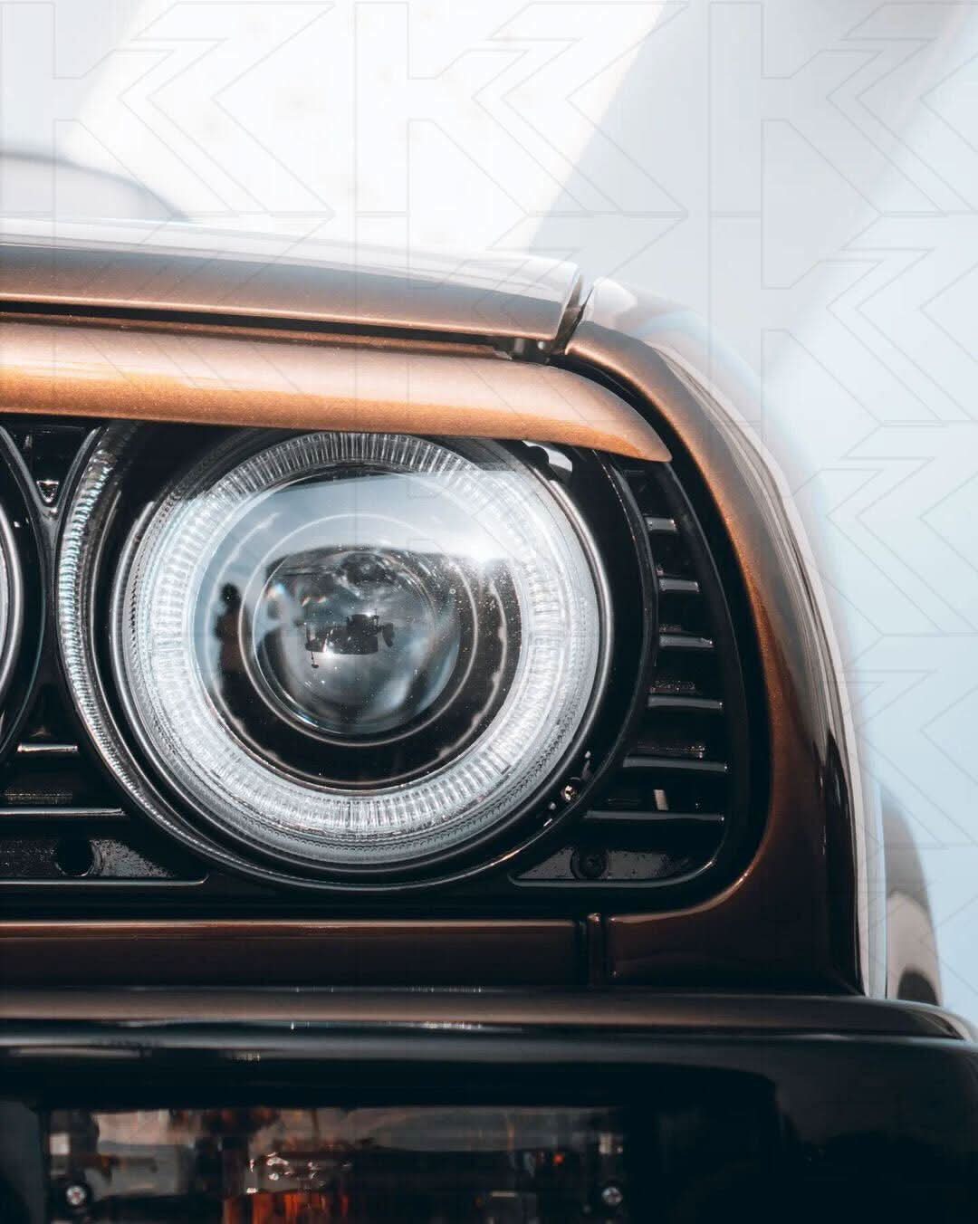 BMW 3-series E30 2/4 door black Angel Eyes headlights set by K2 Industries, for models 1987-1991 with sleek headlight design.
