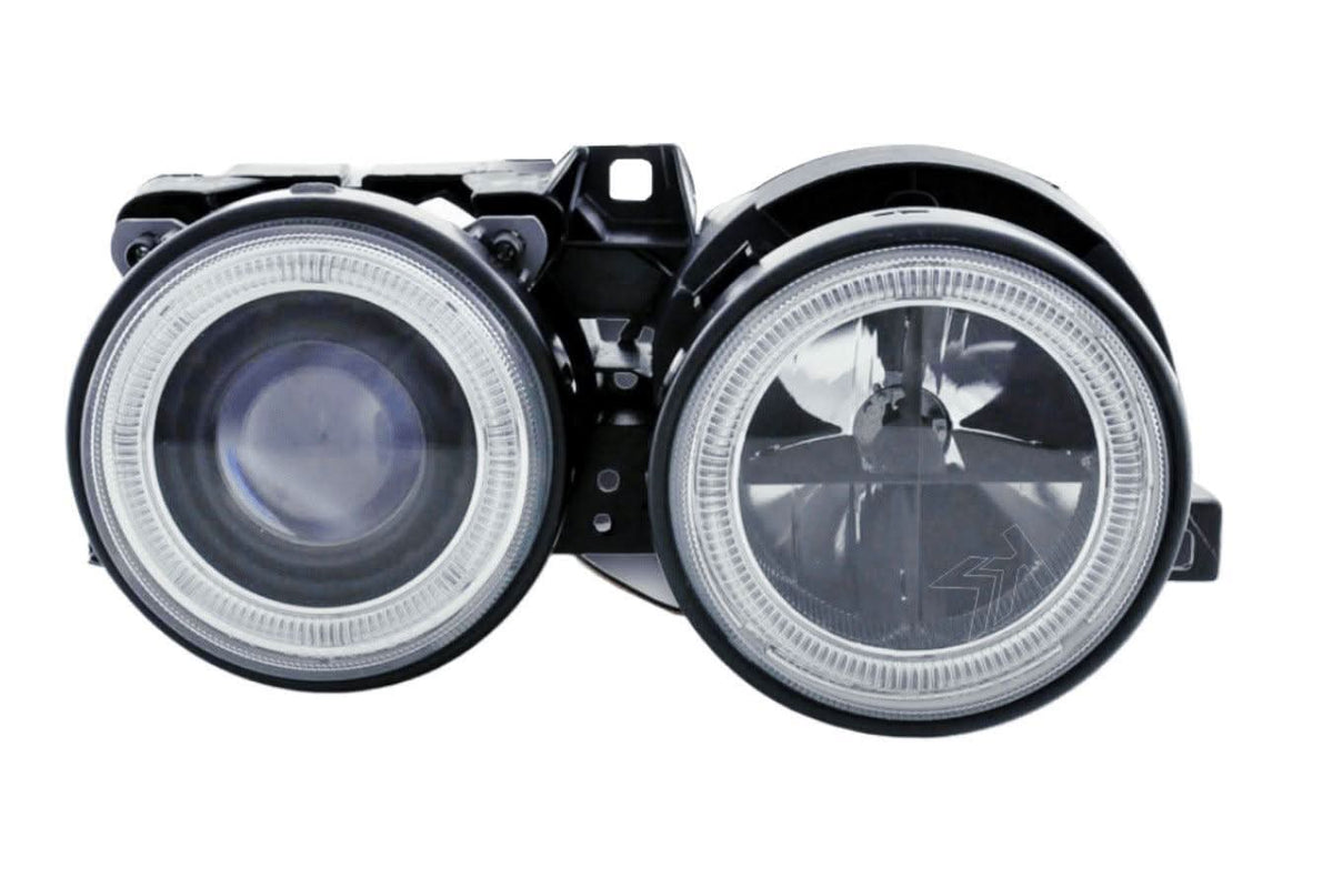 Black Angel Eyes headlight set for BMW 3-series E30 2/4 door from K2 Industries, fits 1987-1991 models.