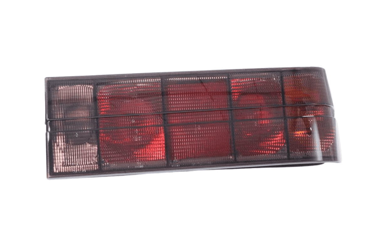 BMW 3 Series E30 original Startec tail lights by K2 Industries, for models 1984-1991, showing the red and clear lens design.