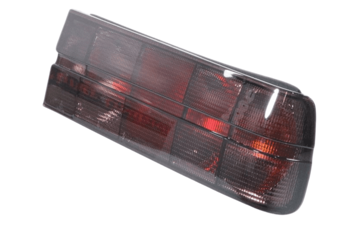 BMW 3 Series E30 original Startec taillights by K2 Industries, showing the red and clear lens design for 1984-1991 models.