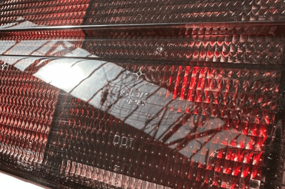 BMW 3 Series E30 original Startec taillights by K2 Industries, rear view showing red and clear lens design for 1984-1991.