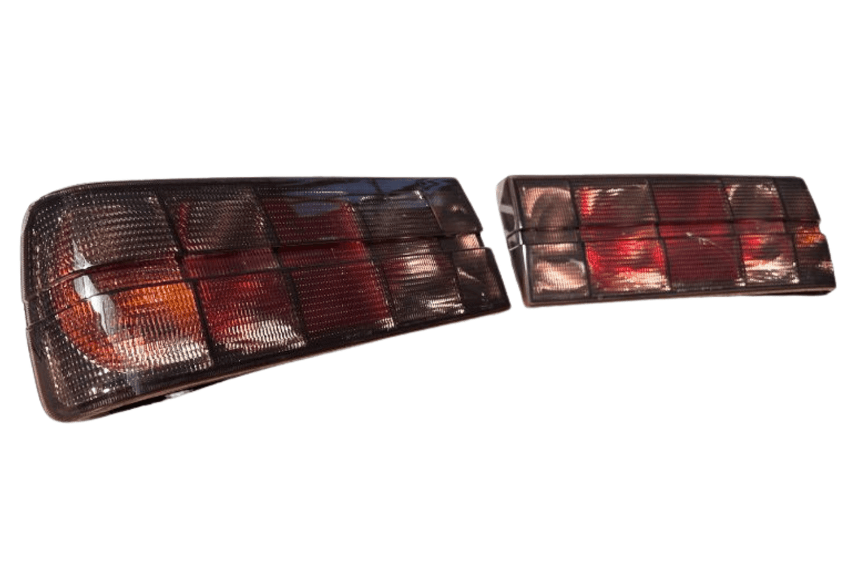 BMW 3 Series E30 original Startec tail lights by K2 Industries, designed for models from 1984 to 1991, showing red and clear lens details.