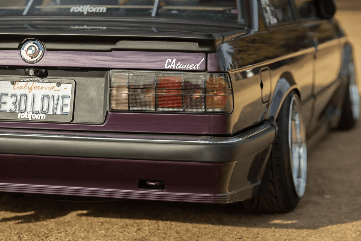 BMW 3 Series E30 K2 Industries original Startec taillights, 1984-1991, showing clear lens and red and amber sections for rear illumination.