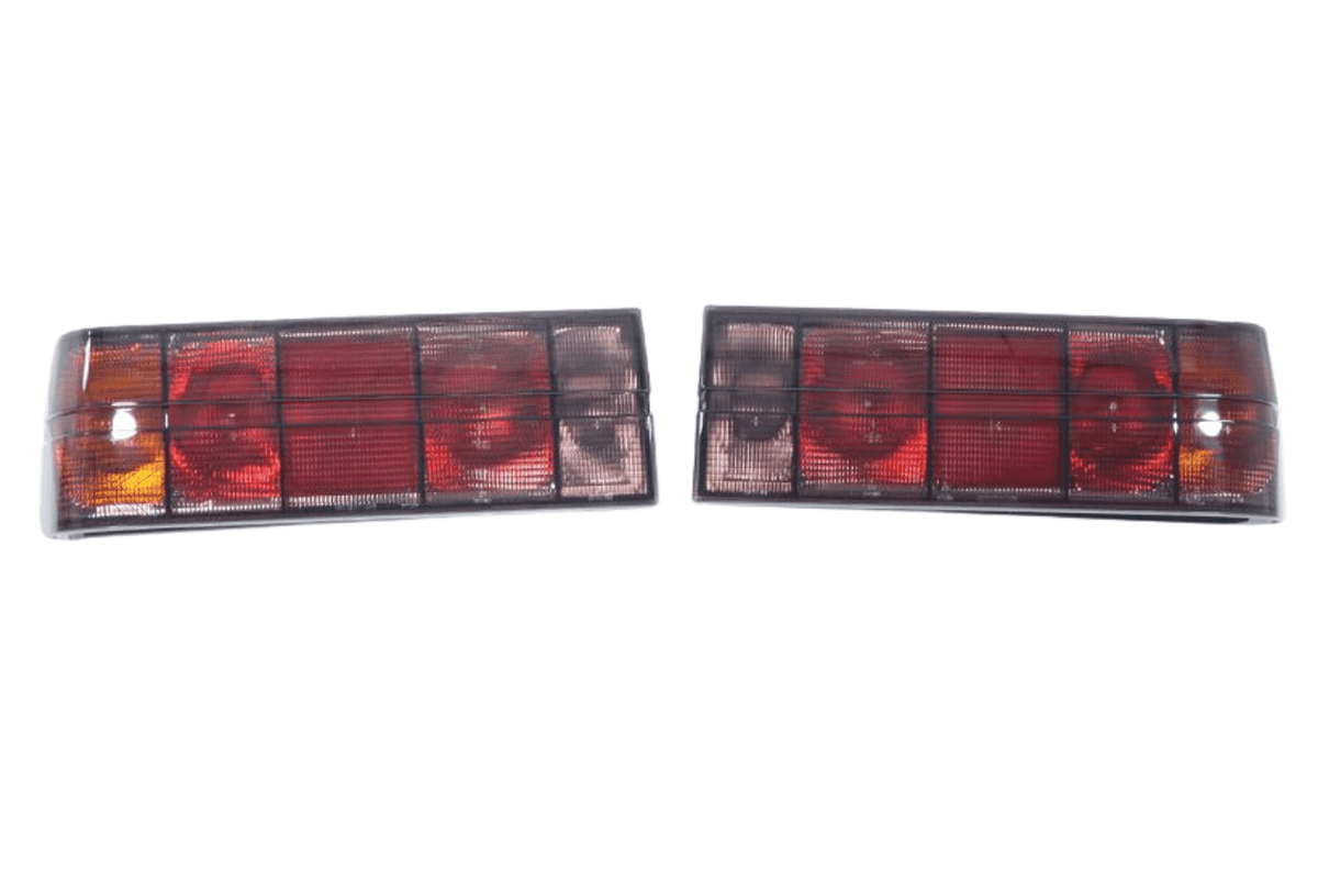 BMW 3 Series E30 original Startec taillights by K2 Industries, rear view showing red and clear lens design for 1984-1991 models.