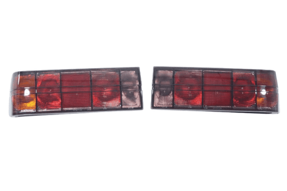 BMW 3 Series E30 original Startec taillights by K2 Industries, rear view showing red and clear lens design for 1984-1991 models.