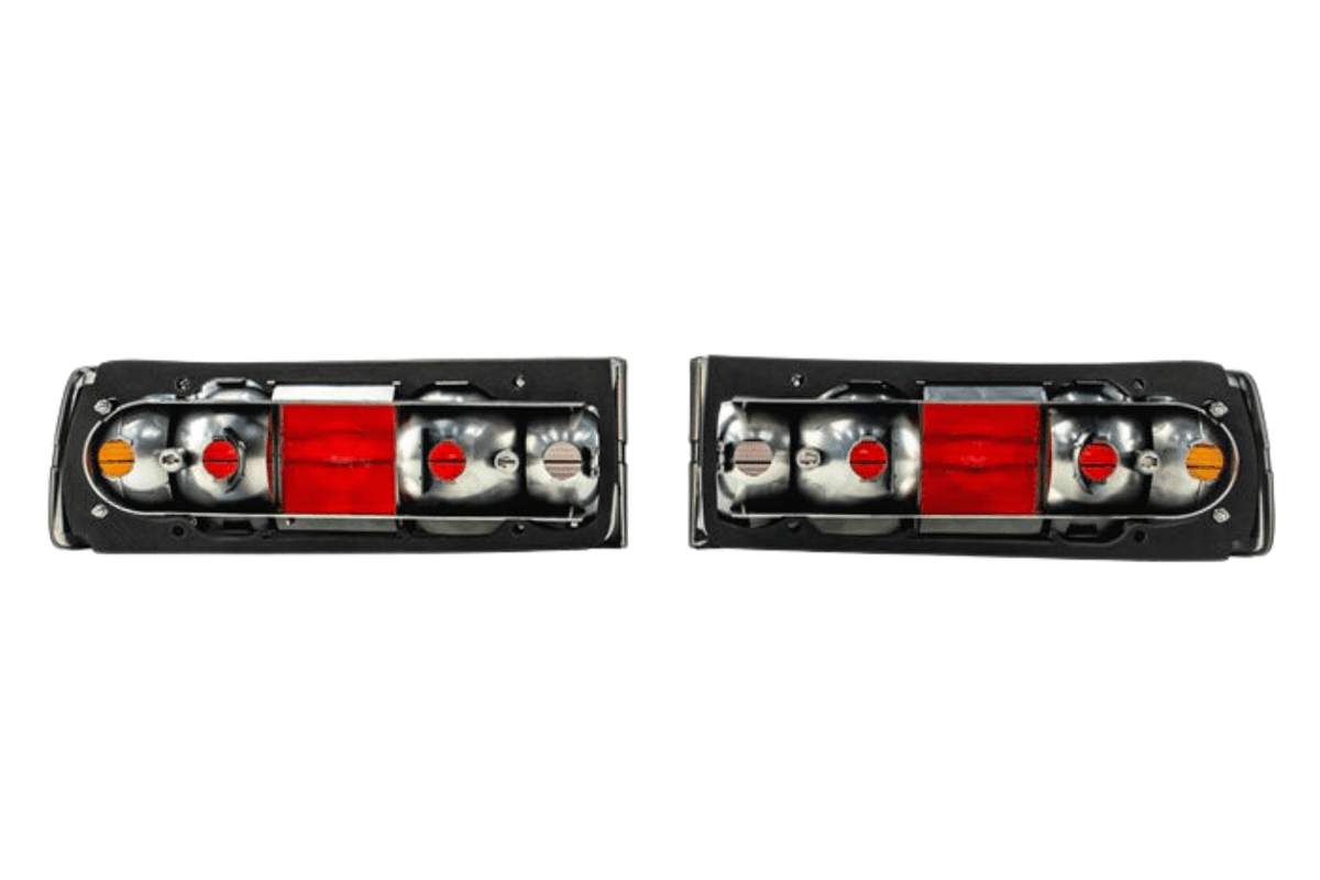 BMW 3 Series E30 original Startec tail lights by K2 Industries, showing red and clear lens sections on a classic 1984-1991 model.