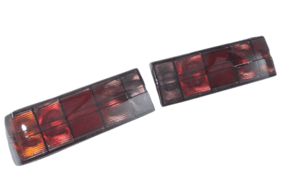BMW 3 Series E30 original Startec taillights by K2 Industries, rear view showing red and amber lens details for 1984-1991 models.