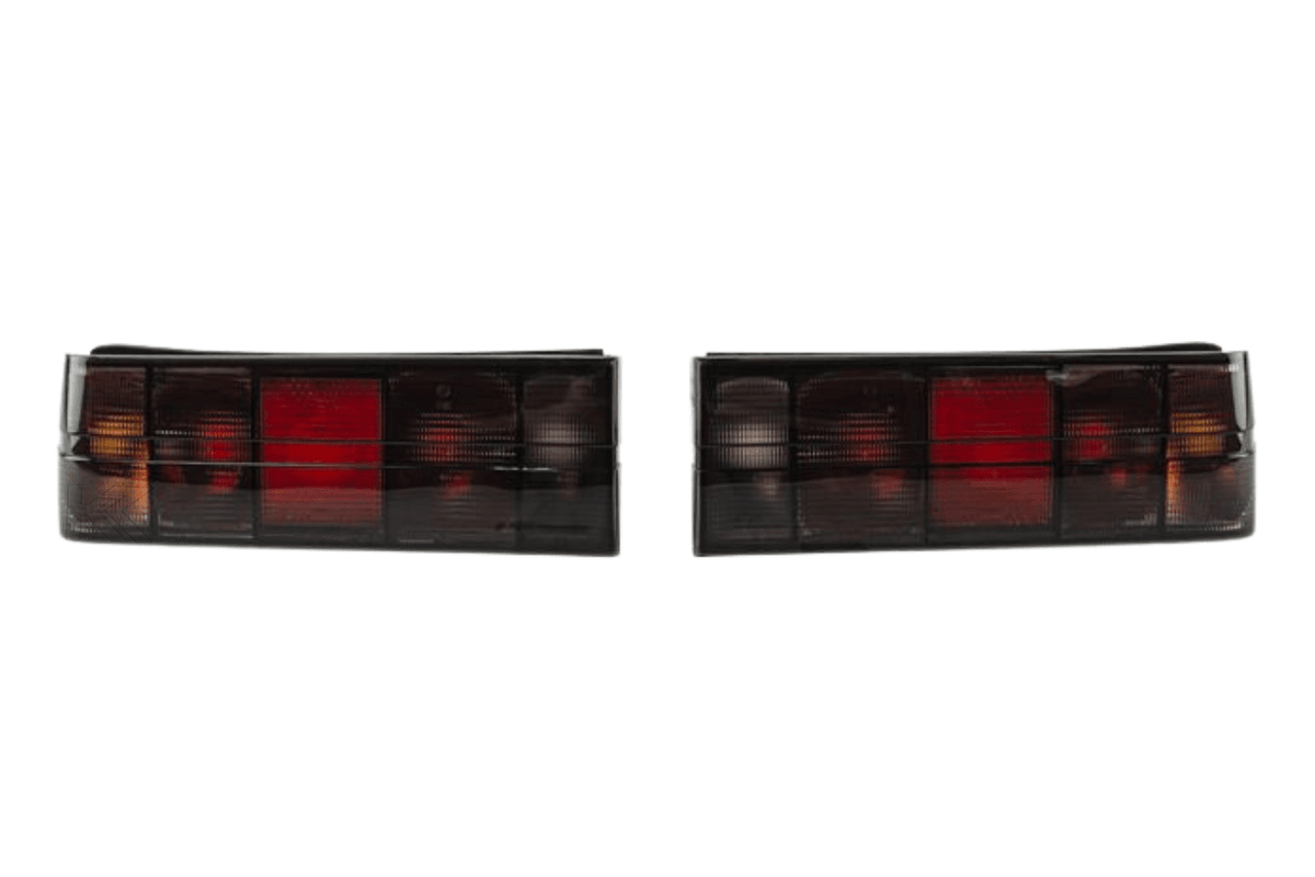 BMW 3 Series E30 original Startec taillights by K2 Industries, designed for models from 1984 to 1991, with red and clear lens details.