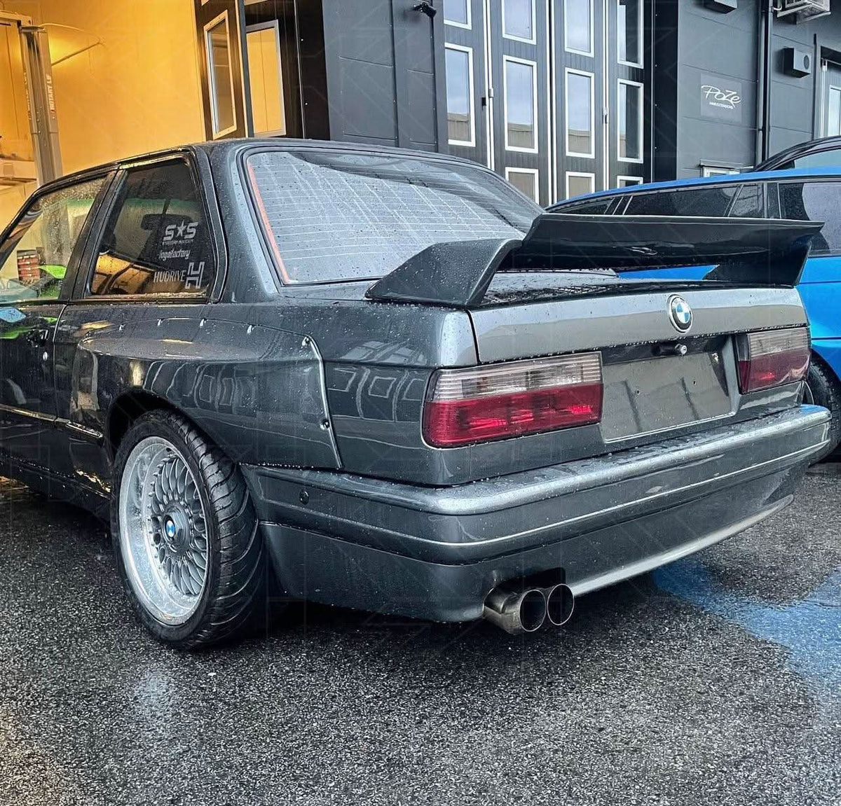 BMW 3-Series E30 facelift tail lights in red and clear by K2 Industries, for models from 1988 to 1994.