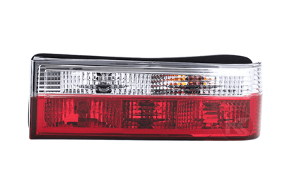 BMW 3-Series E30 pre-facelift tail lights in red and clear, made by K2 Industries, shown on a 1982-1987 model.
