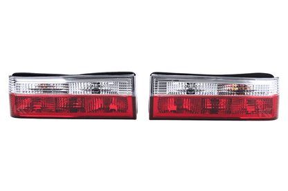 BMW 3-Series E30 pre-facelift tail lights in red and clear, manufactured by K2 Industries, showing the front view of the rear lights.