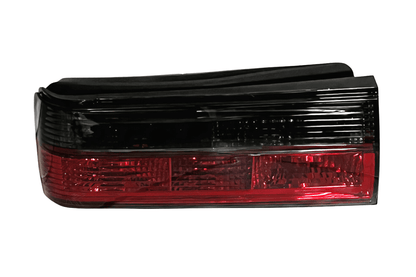BMW 3-Series E30 facelift red smoked tail lights by K2 Industries, showing the sleek design and smoked finish for model years 1988-1994.