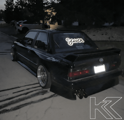 BMW 3-Series E30 pre-facelift red smoked tail lights by K2 Industries, showing close-up of sleek, smoked lens design.