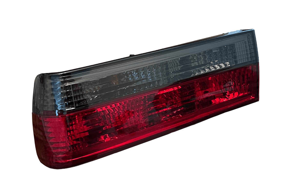 BMW 3-Series E30 red smoked tail lights for pre-facelift models (1982-1987) by K2 Industries, showing close-up of tail light design