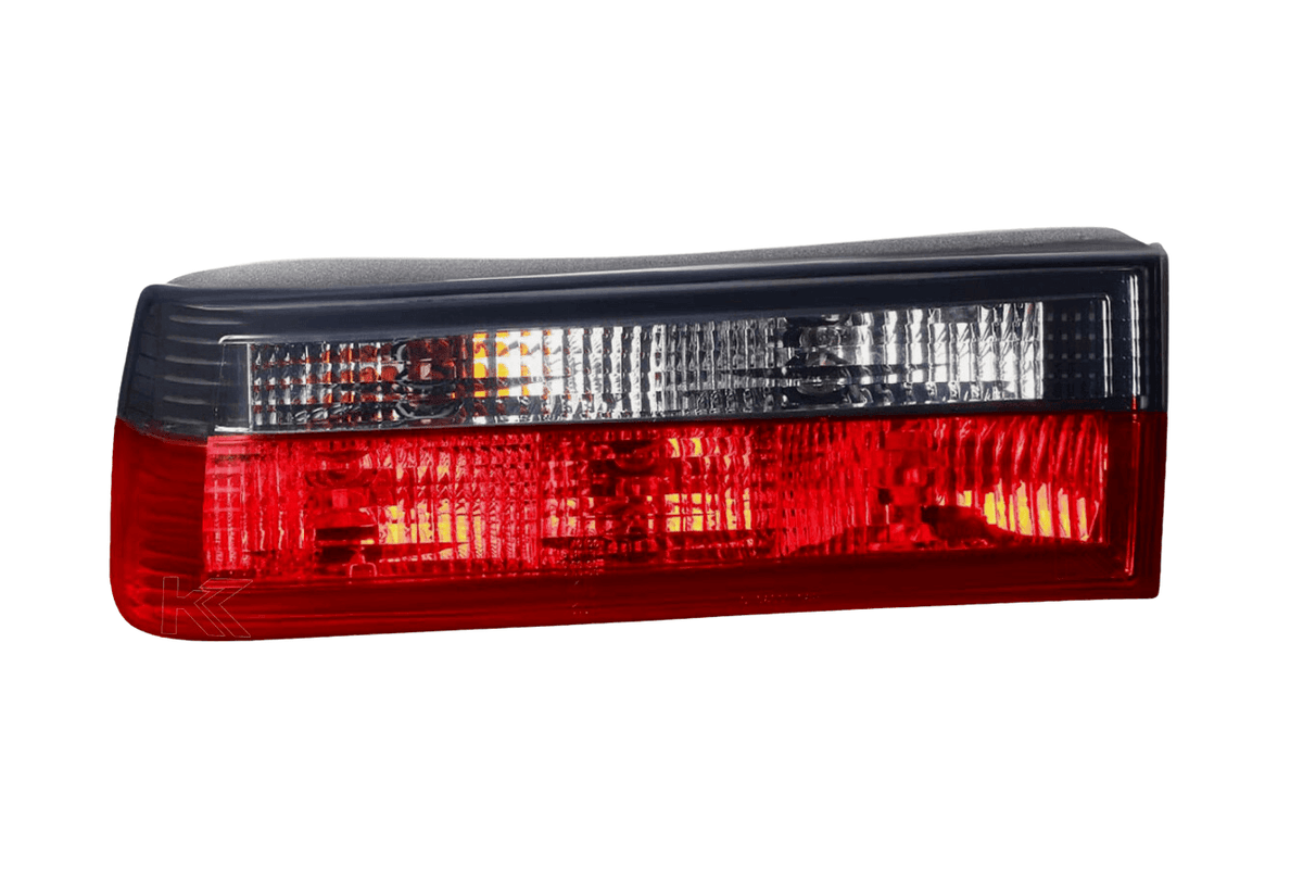 BMW 3-Series E30 pre-facelift red smoked tail lights by K2 Industries, designed for 1982-1987 models, showing the tail light assembly.