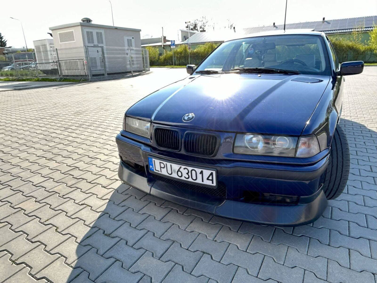 BMW 3-Series E36 Coupe Convertible JDM style body kit by K2 Industries, made of ABS plastic, installed on the car's exterior.