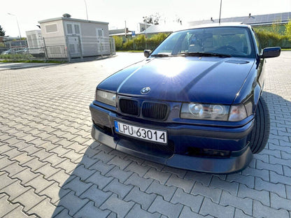 BMW 3-Series E36 Coupe Convertible JDM style body kit by K2 Industries, made of ABS plastic, installed on the car's exterior.
