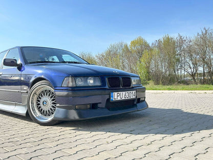 BMW 3-Series E36 coupe convertible with JDM style ABS plastic body kit by K2 Industries, showing front and side profile.