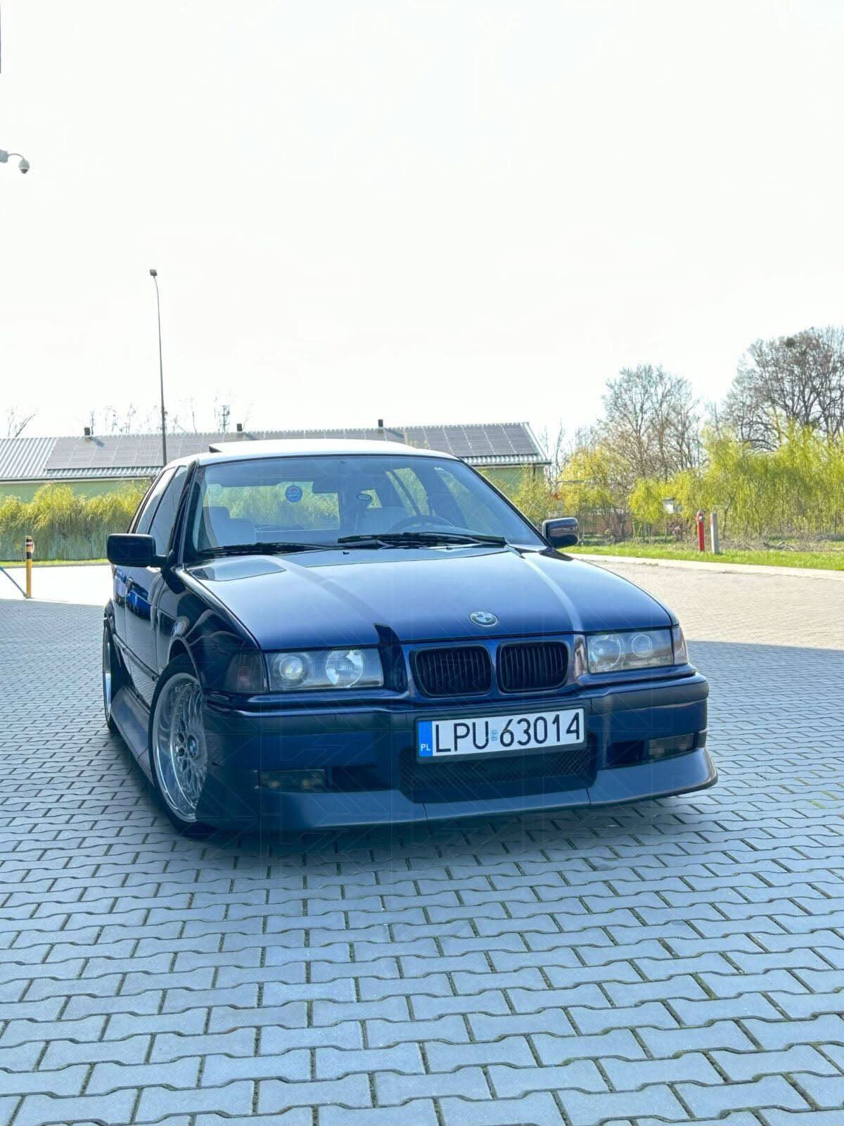 BMW 3-Series E36 Coupe Convertible JDM-style body kit in ABS plastic by K2 Industries, shown on the vehicle.