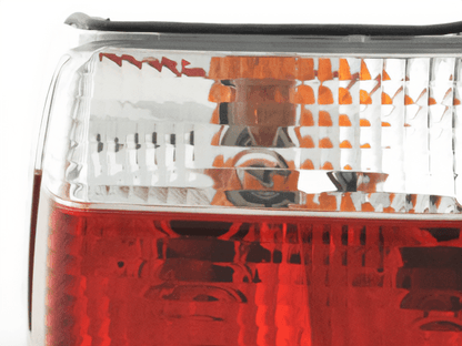 BMW 3 Series E36 Coupe JDM style tail lights by K2 Industries, showing close-up of sleek, clear red and amber lens design.