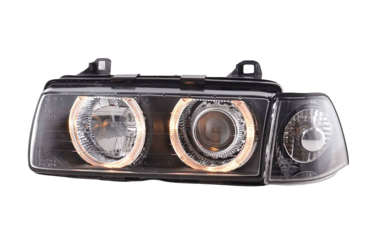 Black BMW 3-series E36 Coupe/Convertible Angel Eye Headlights by K2 Industries, for models 1992-1998, showing the sleek headlight design.
