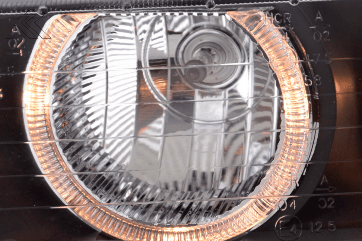 Black BMW 3-Series E36 coupe and convertible headlights with angel eye design, crafted by K2 Industries for 1992-1998 models.