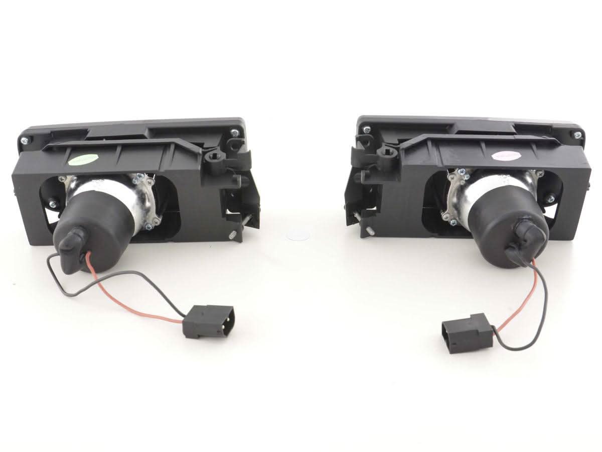 BMW 3-series E36 EVO fog lights by K2 Industries, 1991-2000, showing the sleek fog light design and mounting brackets.