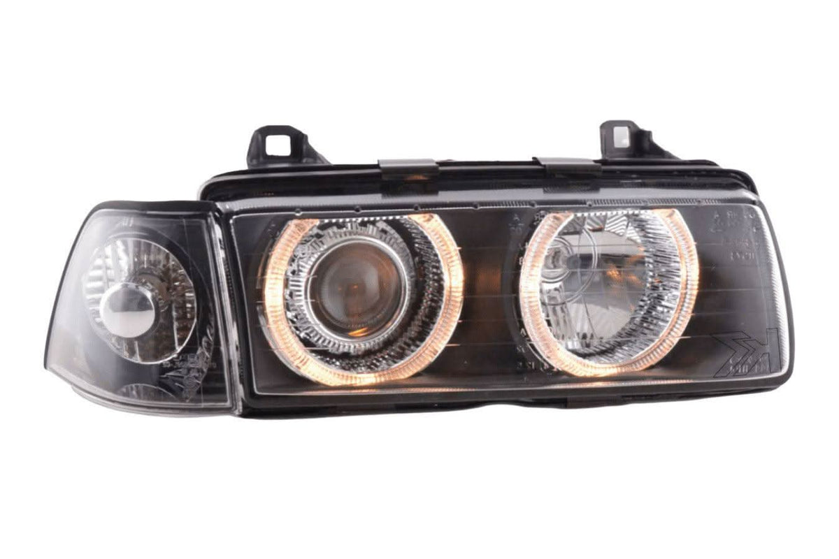 BMW 3 Series E36 sedan black angel eyes LED headlights by K2 Industries, for 1992-1998 models, close-up view of headlights.