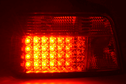 BMW 3-series E36 sedan chrome clear LED tail lights set by K2 Industries, showing the sleek tail light design for 1991-1998 models.