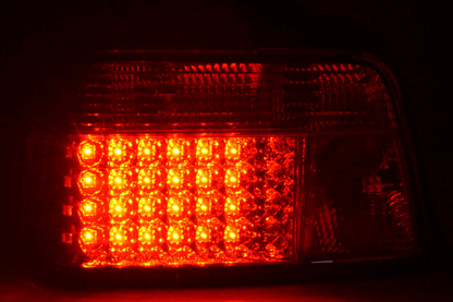 BMW 3-series E36 sedan chrome clear LED taillights set by K2 Industries, for models 1991-1998, showing sleek tail light design.