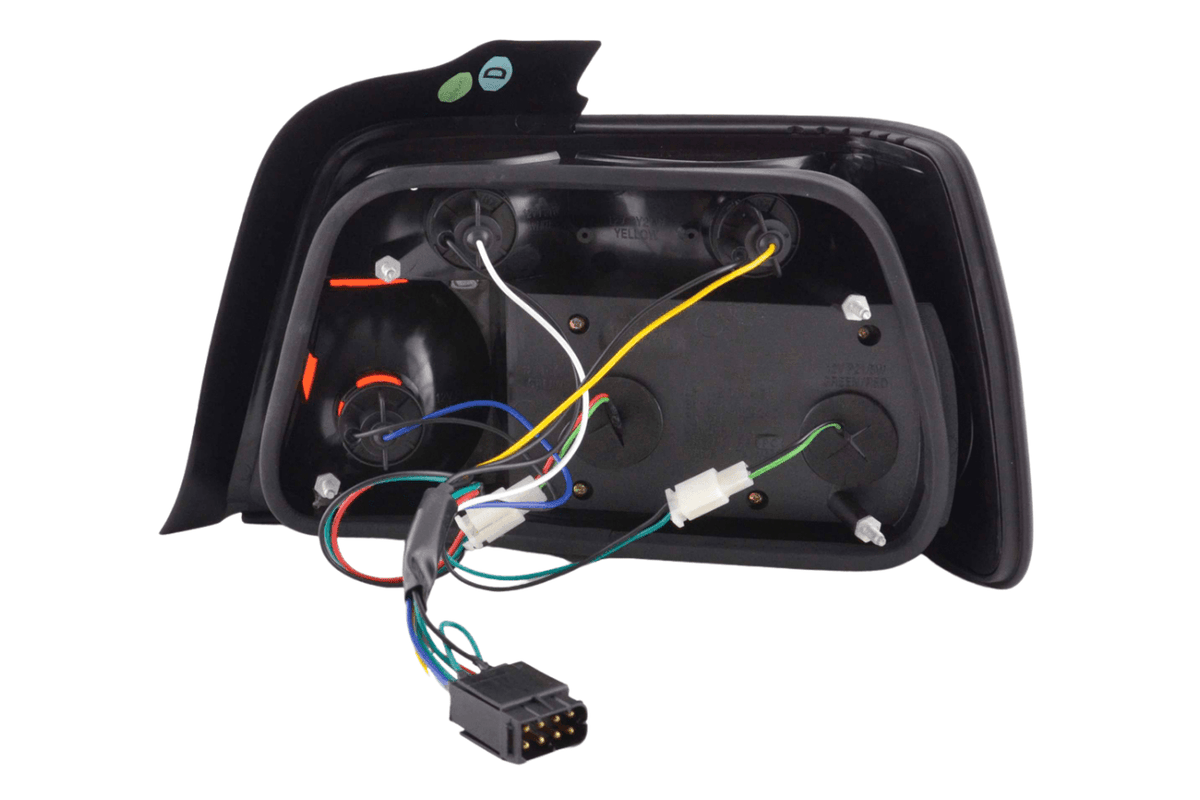 BMW 3-series E36 sedan chrome clear LED taillights set by K2 Industries, for 1991-1998 models, showing front and rear view.