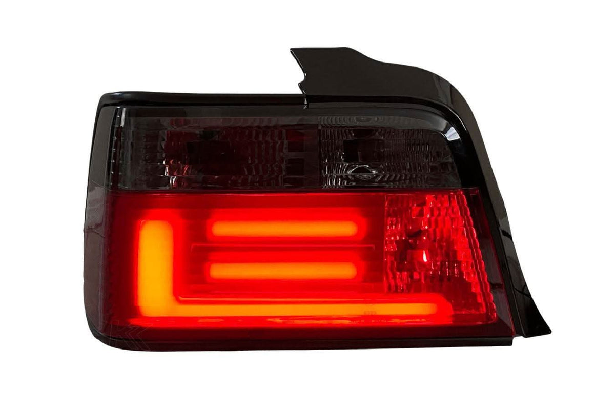 BMW 3 Series E36 sedan tail lights with red and smoke LED bar, aftermarket JDM style, manufactured by K2 Industries.