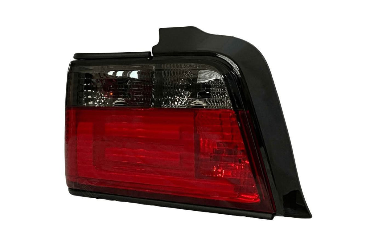 BMW 3 Series E36 sedan JDM red and smoke LED bar tail lights by K2 Industries, rear view showing tail light design.
