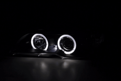 BMW 3-series E46 coupe/convertible black Xenon Angel Eyes headlights by K2 Industries, 2003-2005, with illuminated angel eye rings.