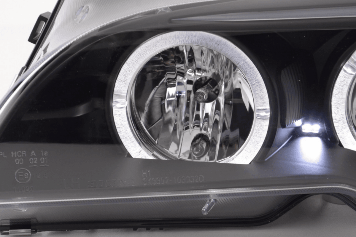 BMW 3-series E46 coupe/convertible black Xenon angel eyes headlights by K2 Industries, for 2003-2005 models.