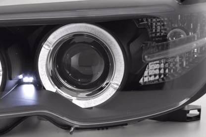 Black Xenon Angel Eyes headlights for BMW 3-series E46 Coupe and Convertible, 2003-2005, by K2 Industries.