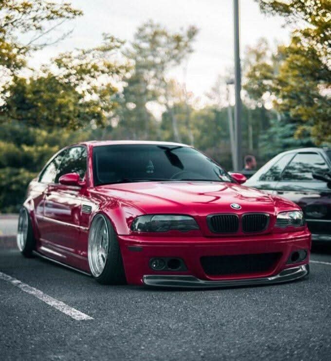 BMW 3-Series E46 M3 CSL front lip in ABS from K2 Industries, designed for models 1999-2005, shown installed on the vehicle.
