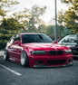 BMW 3-Series E46 M3 CSL front lip in ABS from K2 Industries, designed for models 1999-2005, shown installed on the vehicle.