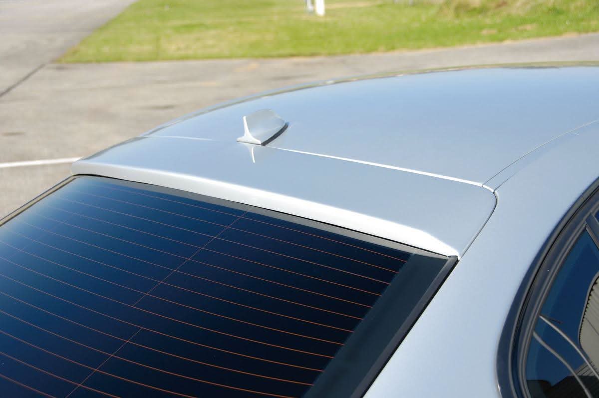 K2 Industries BMW 3-Series E46 Rieger rear window cover showing sleek black design and custom fit for the vehicle.