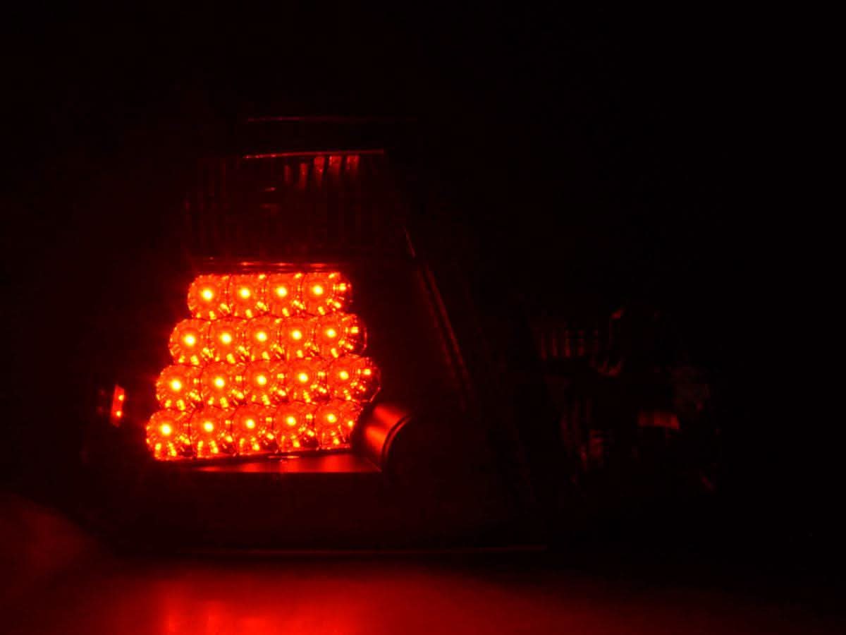 Black Altezza style LED taillights for BMW 3 Series E46 sedan pre-facelift, showing sleek design and clear lens details.